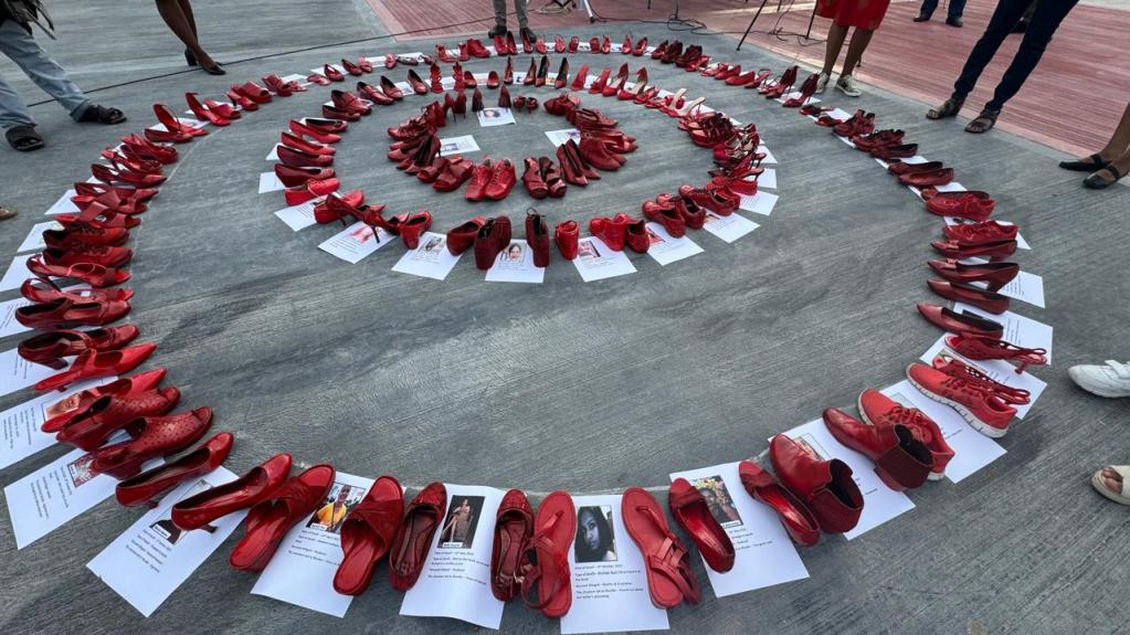 A circle of red shoes.