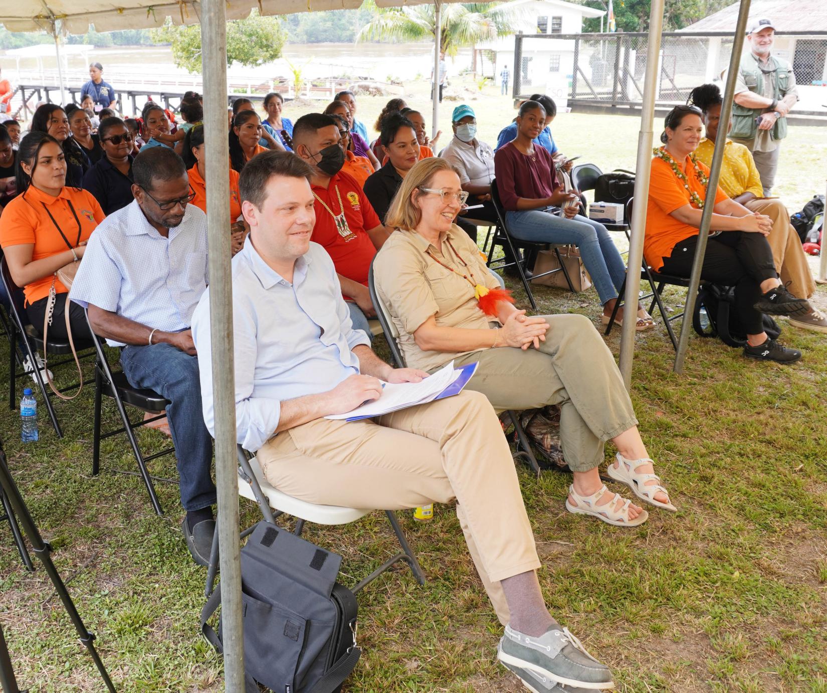 A group of people seated.