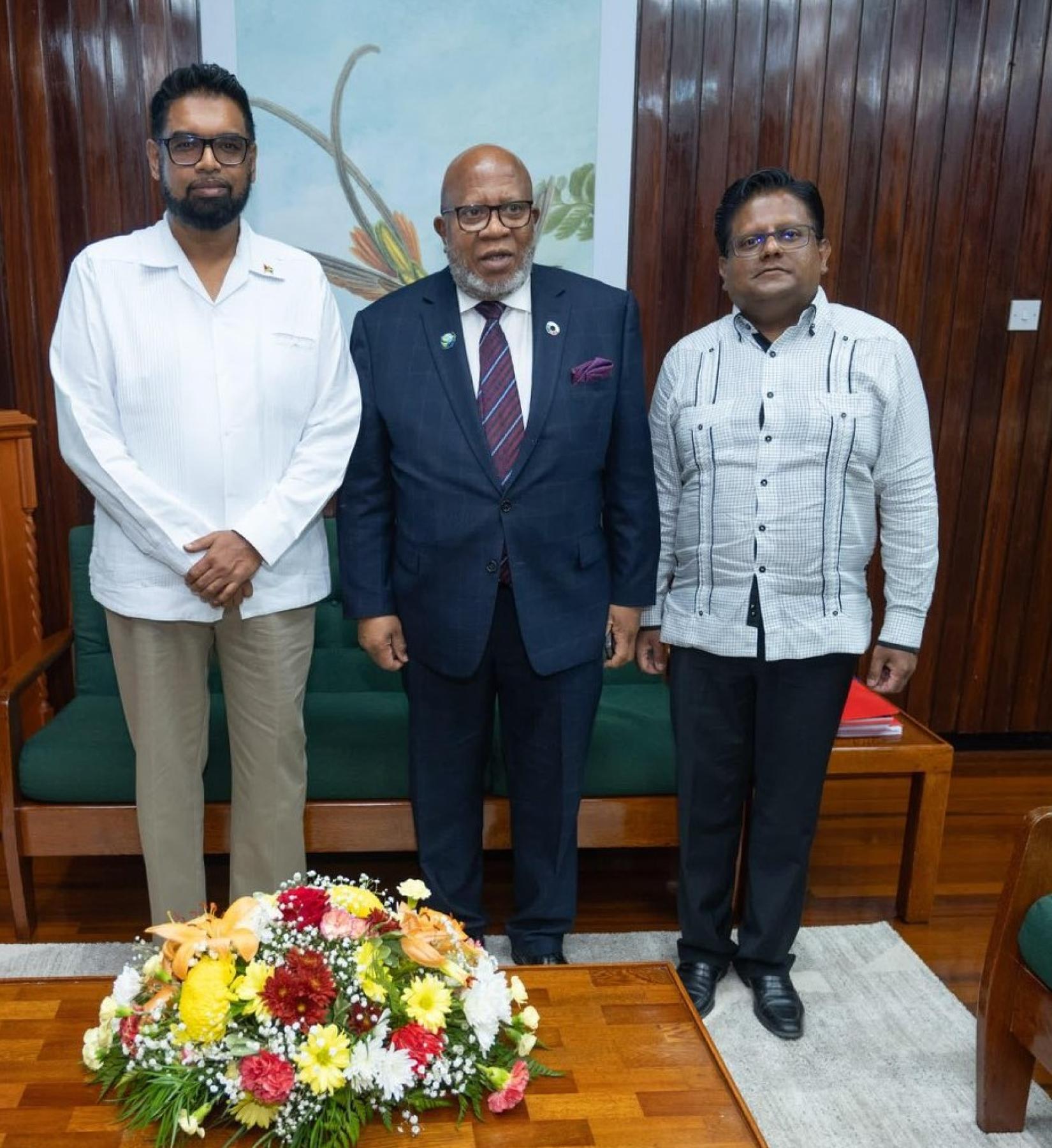 Three men standing.