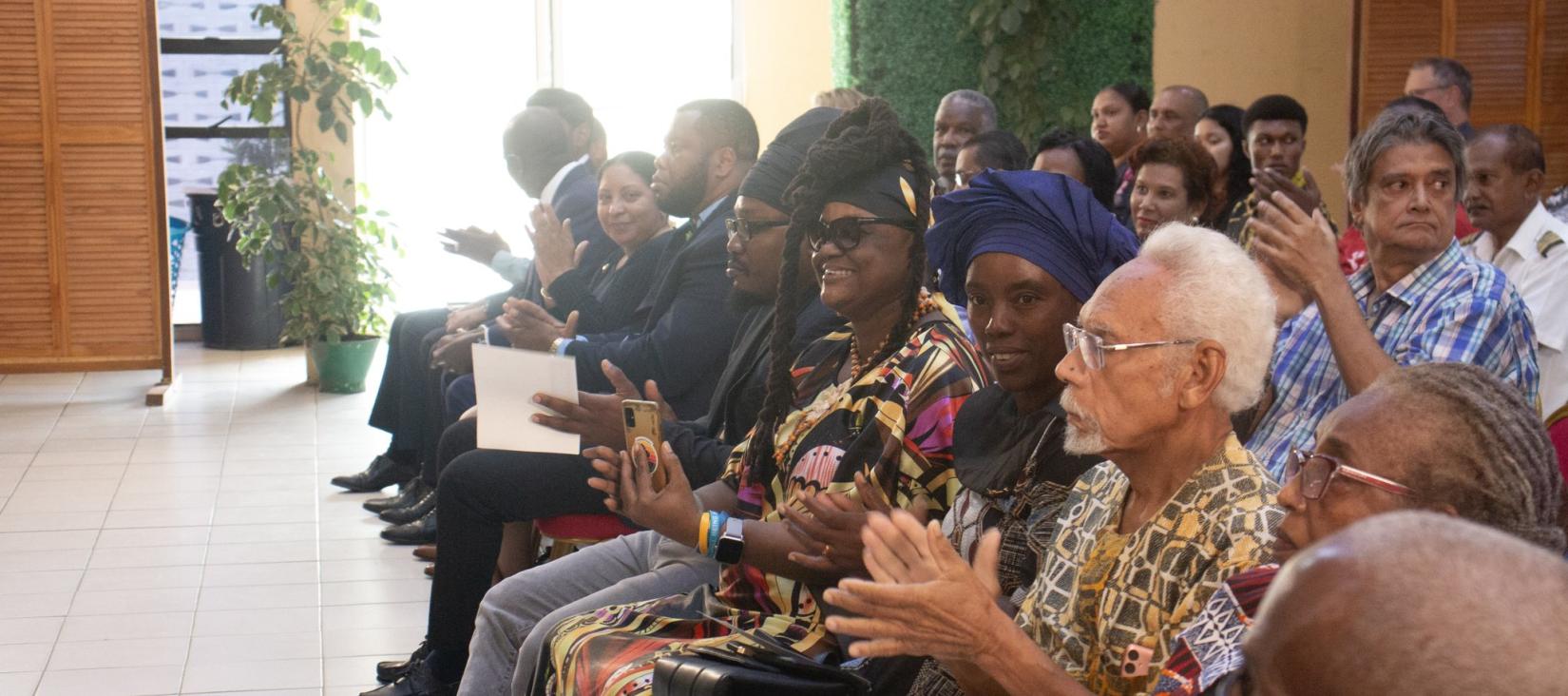 A group of people seated.