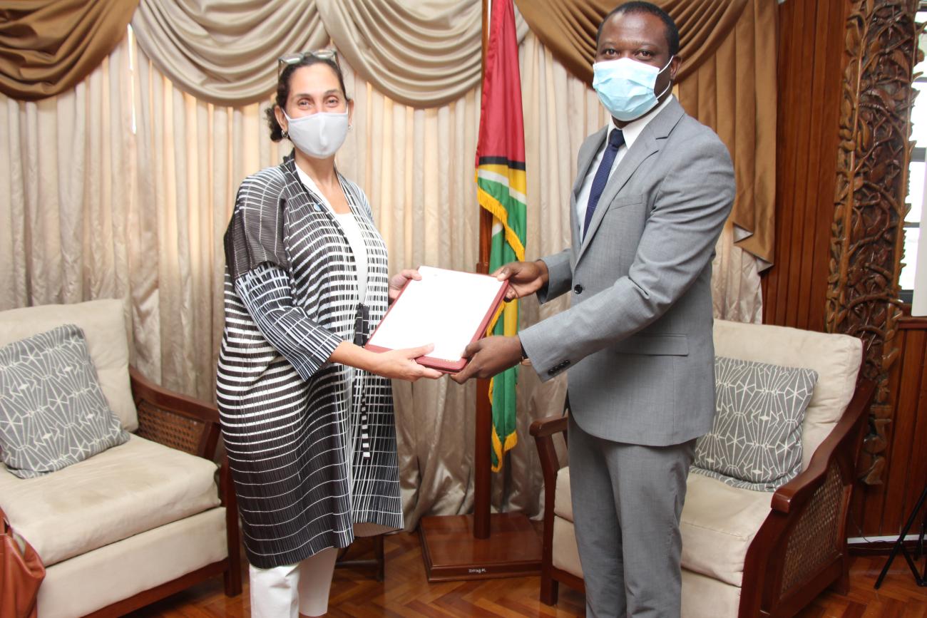 Ms. Yeşim Oruç, new United Nations Resident Coordinator to Guyana, presents her letter of credence to the Honourable Hugh Todd, MP, Minister of Foreign Affairs and International Cooperation.