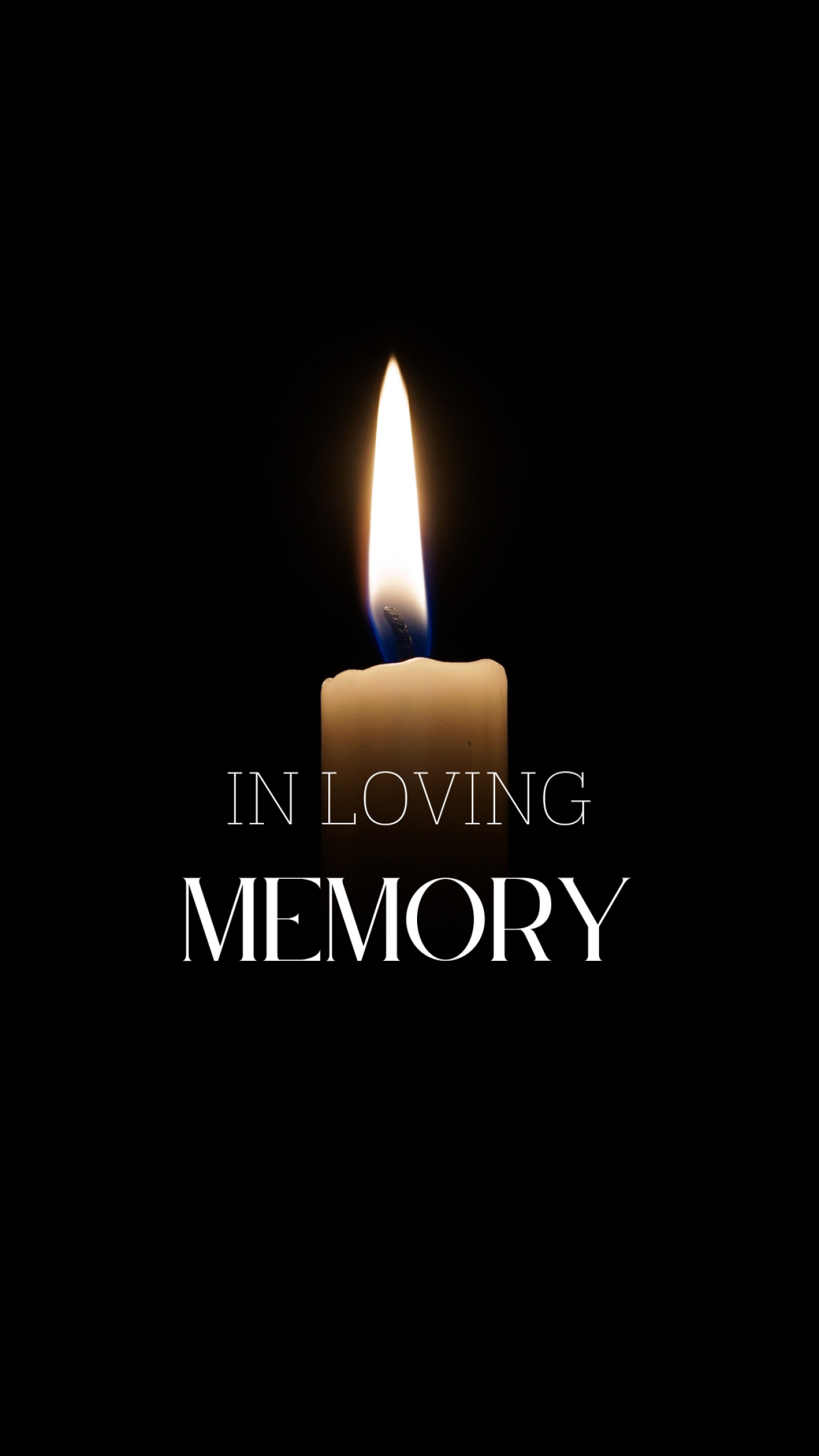 A black background with a candle and the words In Loving Memory