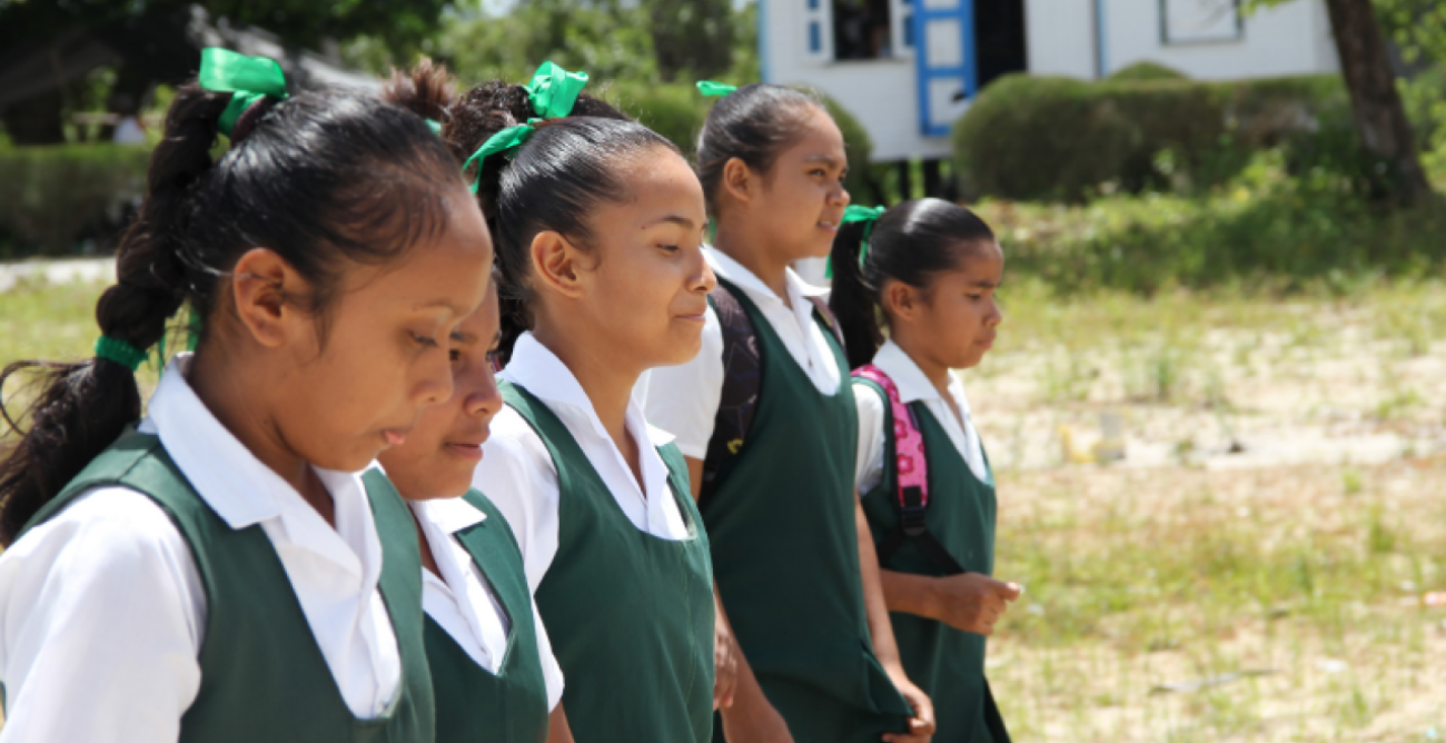 Four girls standing.