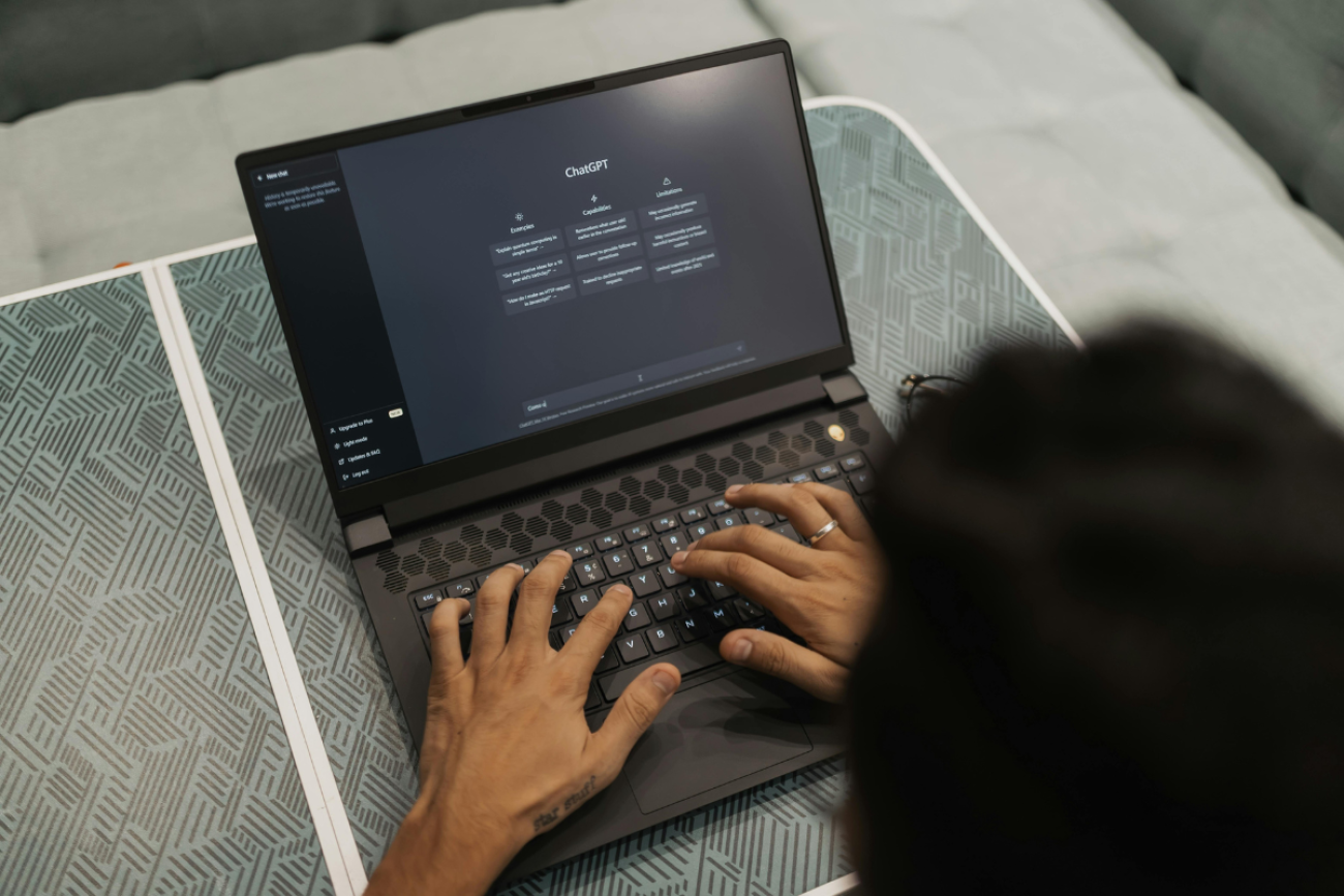 Some in front of a laptop typing.