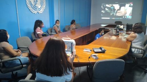 Refugees, migrants and locals participate in the UNHCR facilitated training to learn how to use sewing machines in Guyana.