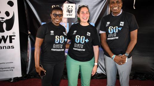 Yeşim Oruç, UN Resident Coordinator (center) with Aiesha Williams, Country Manager, WWF-Guianas; and Alfred Mentore, Deputy Mayor of Georgetown at Earth Hour 2022.